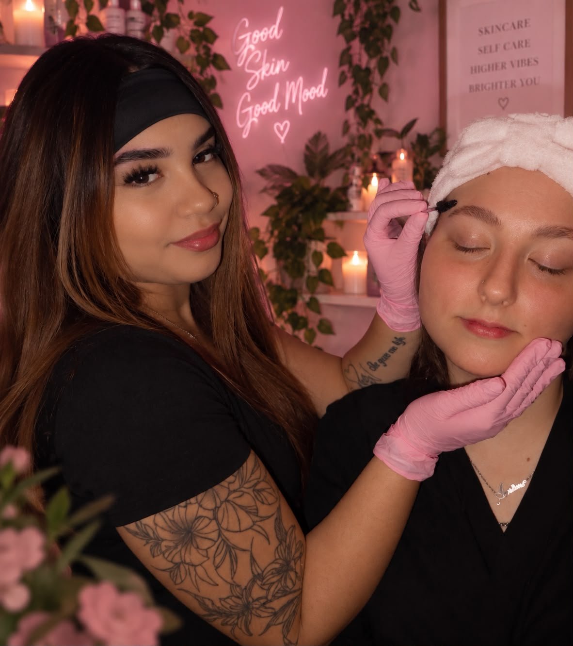 Esthetician performing an eyebrow treatment
